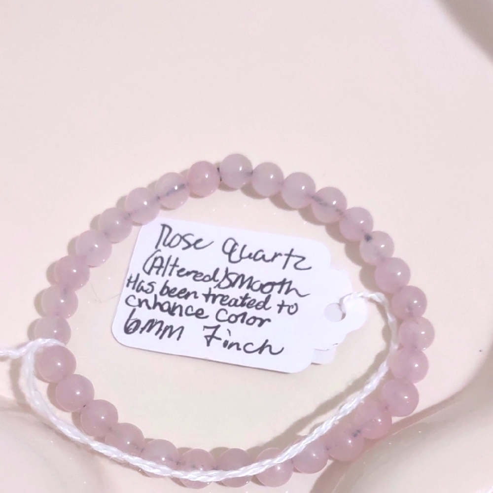 HAND CRAFTED ROSE QUARTZ (ALTERED)HAS BEEN TREATED TO ENHANCE COLOR 6MM BEADS